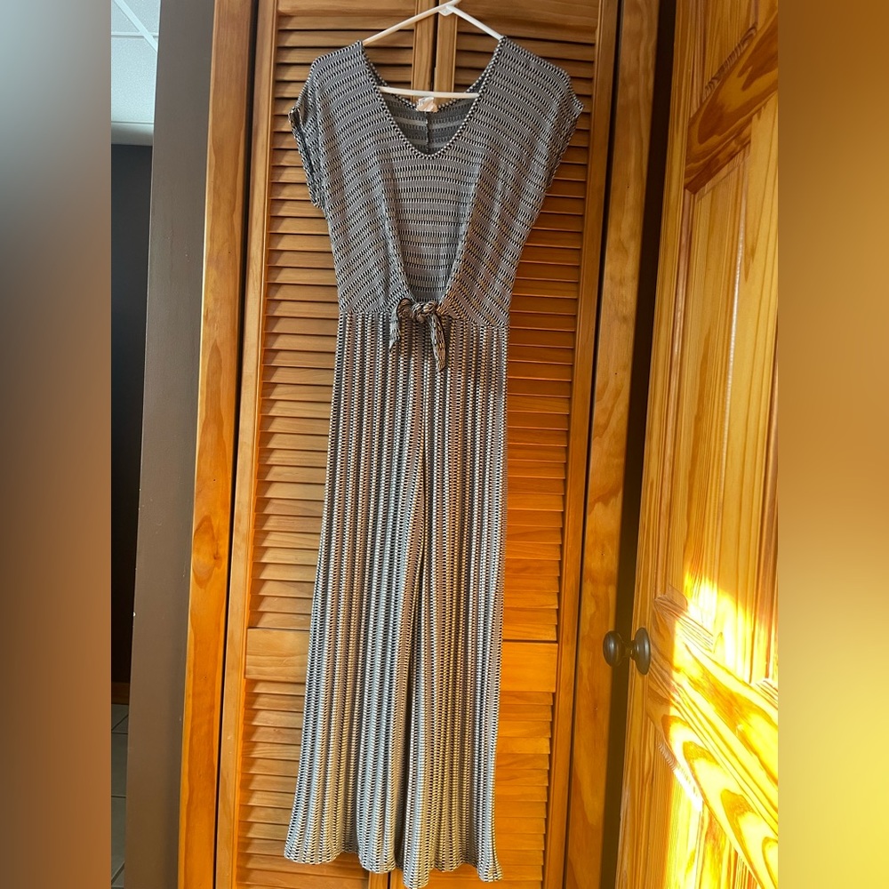 Caution to the wind romper/jumpsuit size medium black /white soft material